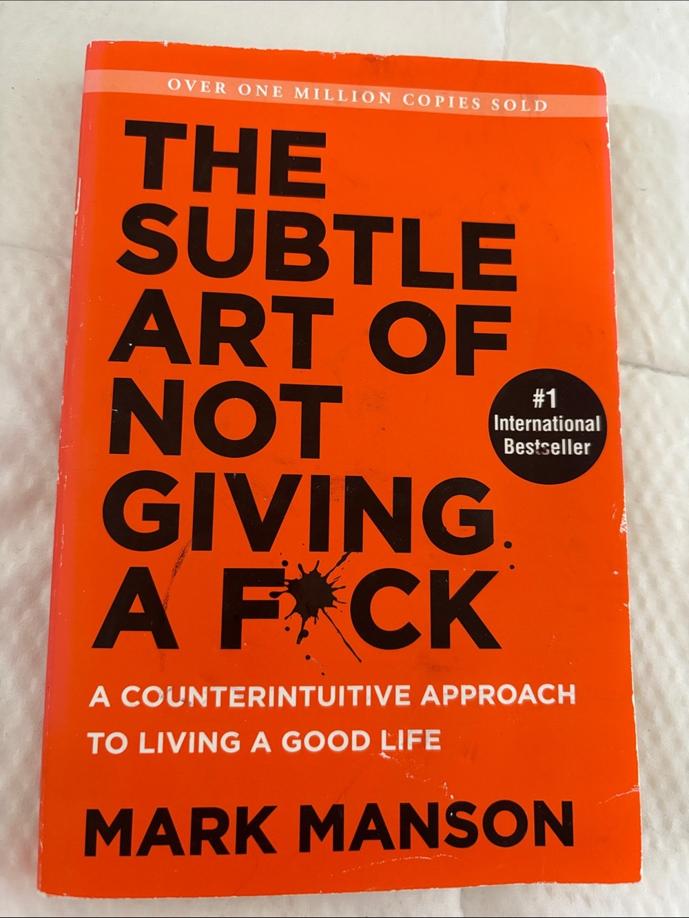 Orange Paperback: The Subtle Art of Not Giving a F*ck